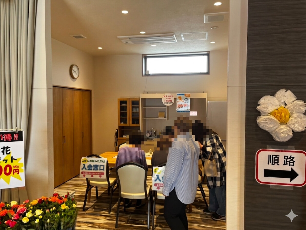 入会ブースでご案内するスタッフとお客様の様子